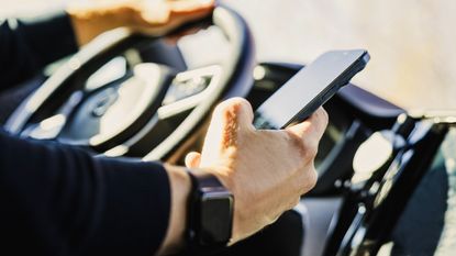 A person on the phone while driving