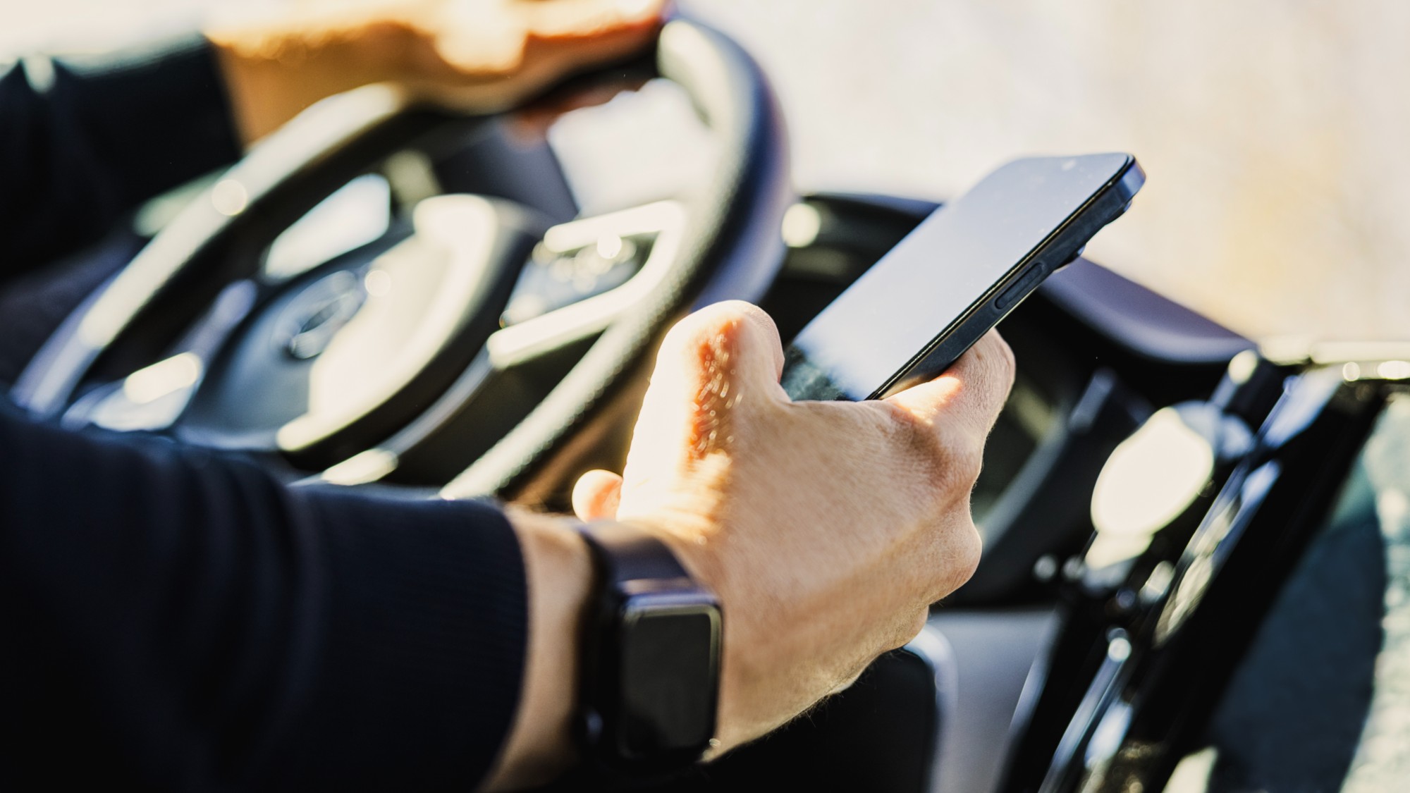 A person on the phone while driving