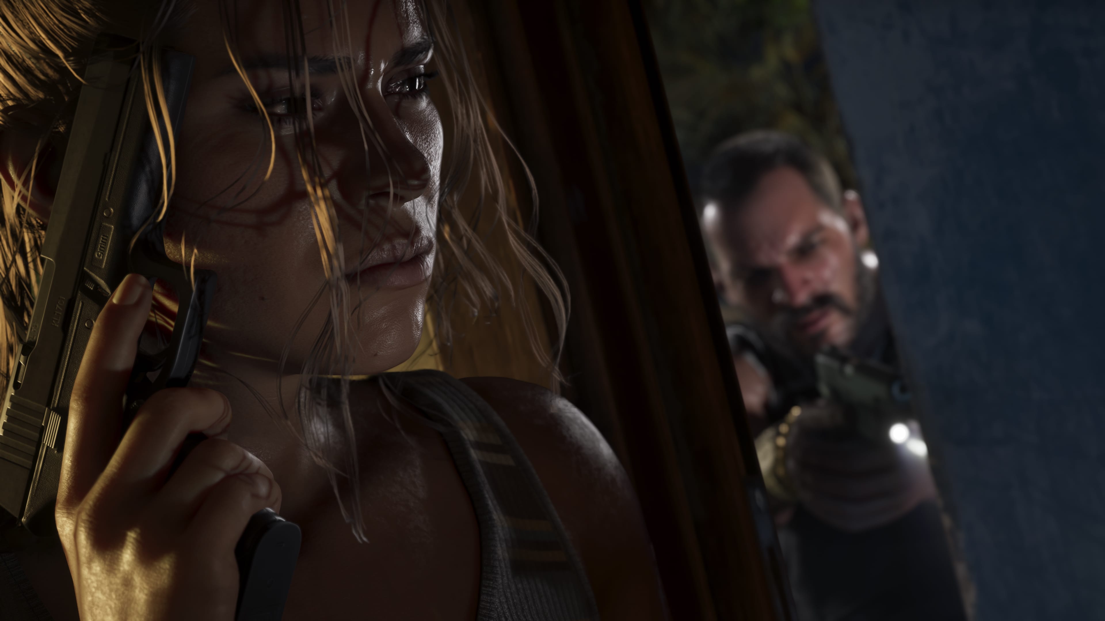 A close-up of Lucia holding a Klose K17 pistol