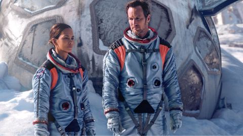 A still from the movie Moonfall from Lionsgate with two astronauts stood in front of spacecraft