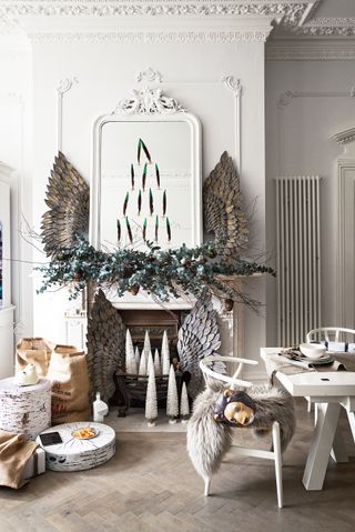 White dining room decorated for Christmas