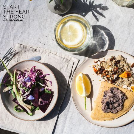 A salad and a frittata with lots of vegetables