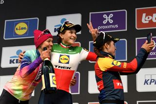 From left: Second place Canyon-SRAM Polish roder Katarzyna Niewiadoma, winner Lidl-Trek's Italian rider Elisa Longo Borghini, and third place Lidl-Trek's Dutch rider Shirin Van Anrooij celebrate on the podium following the women's race of the 'Ronde van Vlaanderen' (Tour des Flandres) one day cycling race, 163 km from Oudenaarde to Oudenaarde, on March 31, 2024. (Photo by LAURIE DIEFFEMBACQ / Belga / AFP) / Belgium OUT (Photo by LAURIE DIEFFEMBACQ/Belga/AFP via Getty Images)