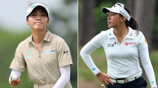 Lydia Ko waves to the crowd, while Jeeno Thitikul walks off the green