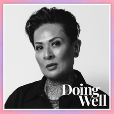 black and white portrait of Chef K on a pink and purple ombré background with text that says "Doing Well" 