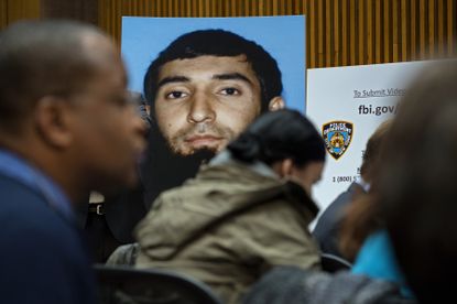 A photo of Sayfullo Saipov displayed at a news conference.