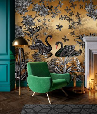 Mural wallpaper with black swans next to fireplace with arm chair in front
