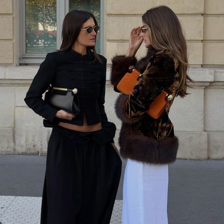 Coco Schiffer and Sara Walker in Bvlgari clutches