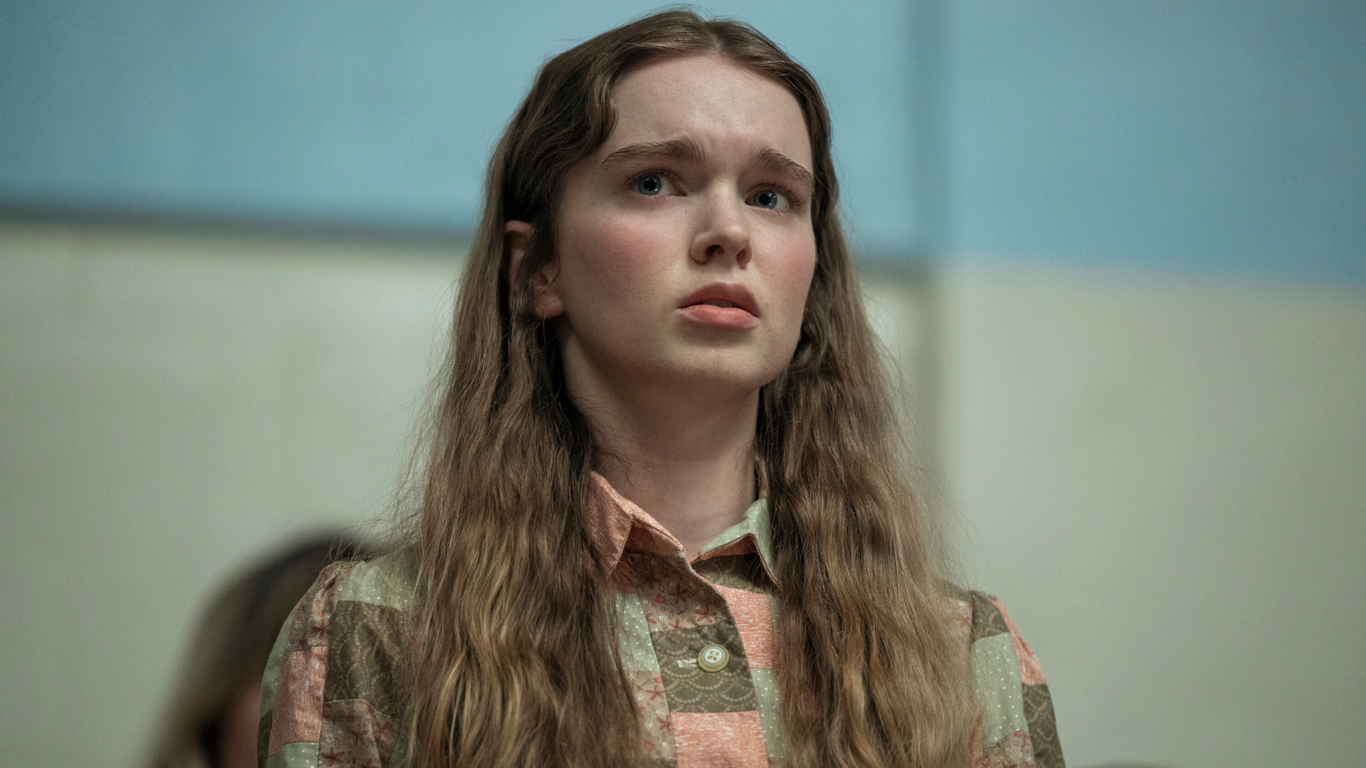 A teenage girl wearing a patchwork blouse (Summer H. Howell as Carrie), in Prime Video's 'Carrie.'