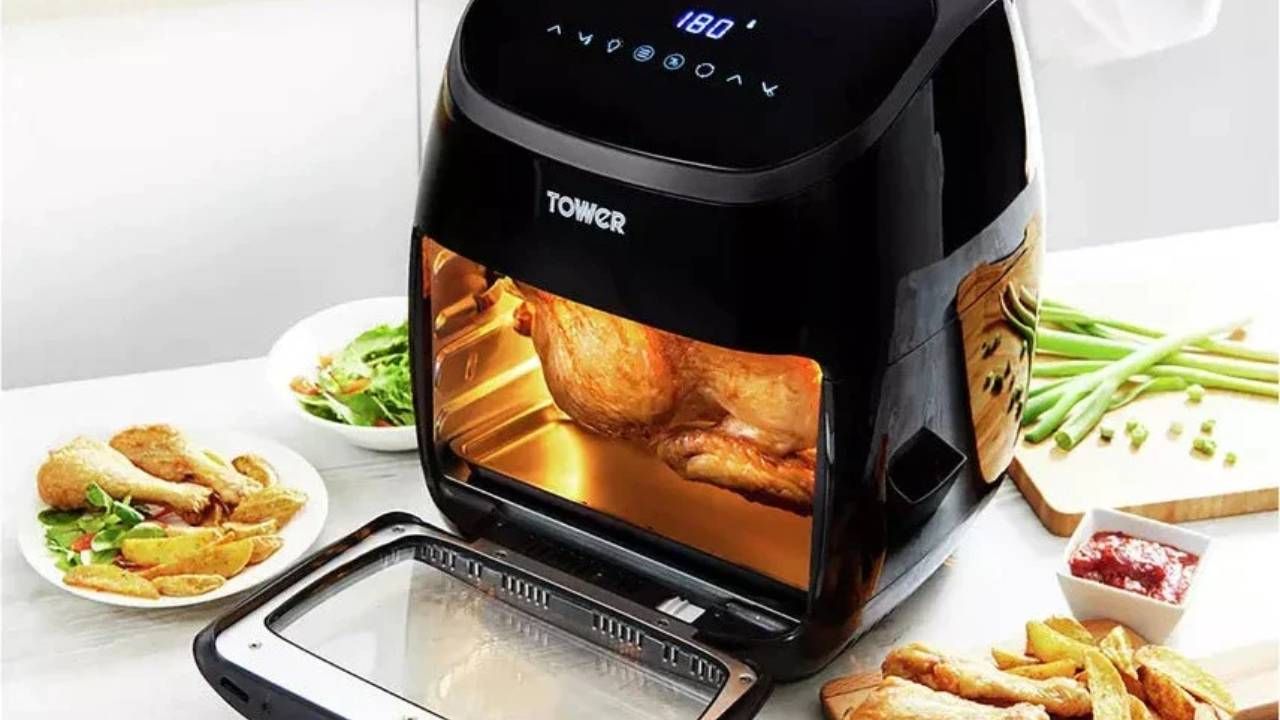 A close up of a chicken inside a Tower air fryer