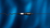 A Shure MVX2U Gen 2 connecting a USB cable with an XLR cable on a blue background
