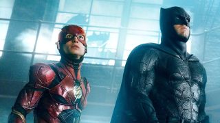 Ezra Miller's Flash and Ben Affleck's Batman staring upwards in Justice League