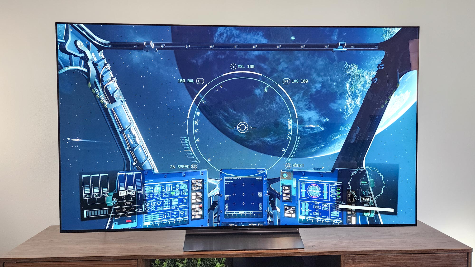 LG C4 OLED TV shown in a living room