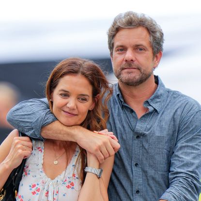 Katie Holmes wears a floral Doen shirt beloved by Taylor Swift with baggy pants and ballet pumps as she walks with former Dawson's Creek costar Joshua Jackson