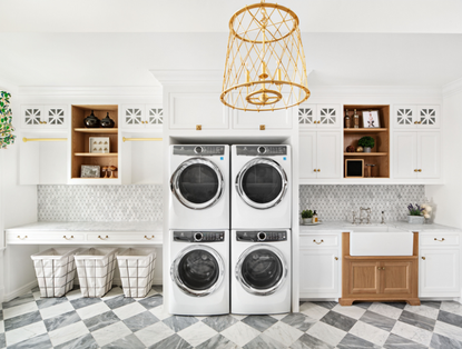 LArge laundry room with double washer dryer by the fox group