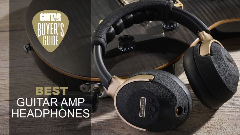 A pair of Positive Grid Spark Neo guitar amp headphones leaning against an electric guitar