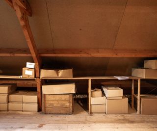 cardboard boxes in an empty loft space