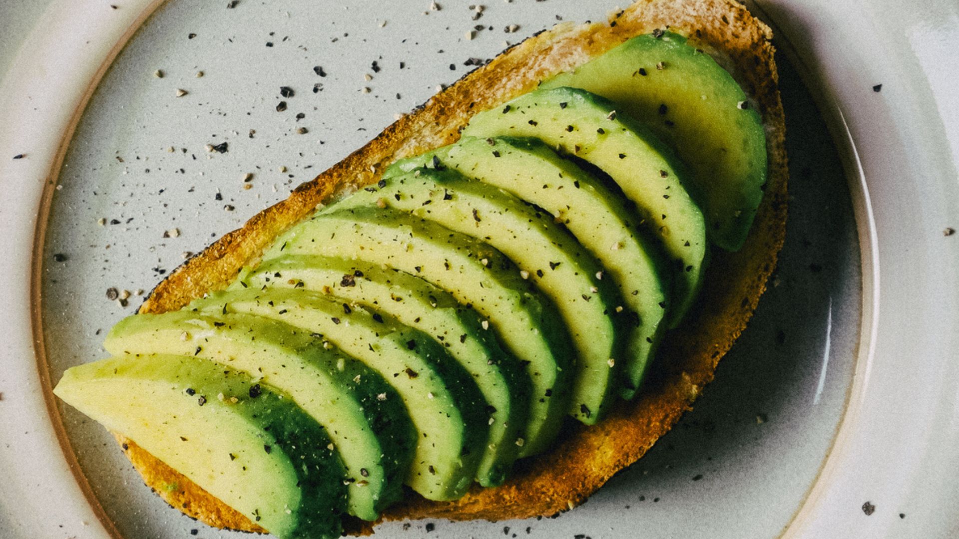 Sliced avocado on toast