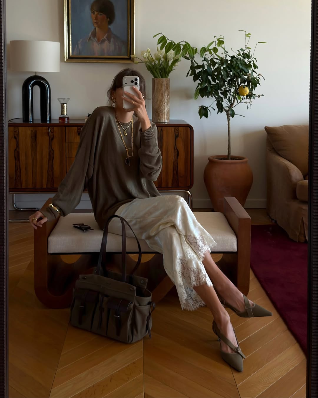 @juliesfi wears satin/lace cropped trousers with pointed toe shoes