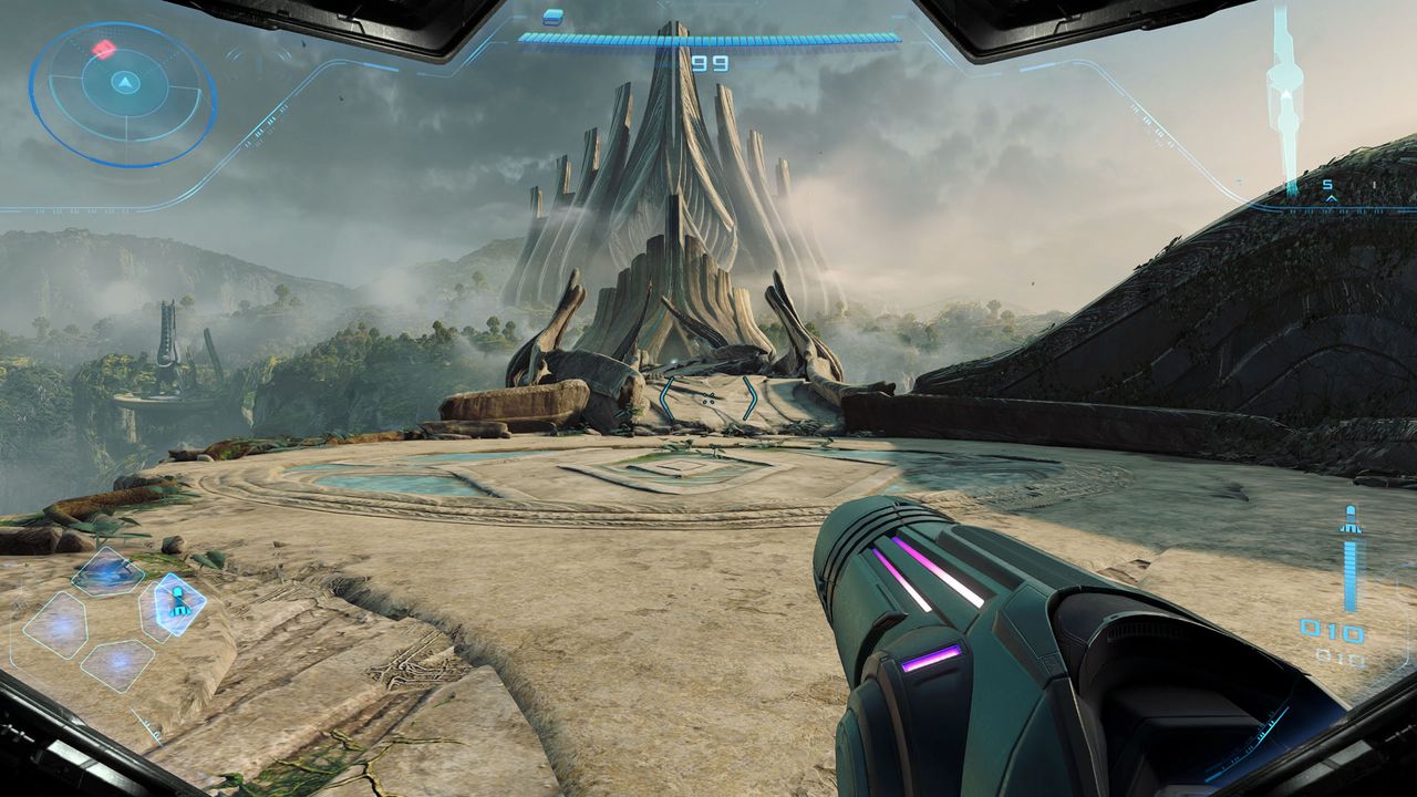 Samus explores the outside of an ancient ruin in Metroid Prime 4: Beyond, approaching a bridge that leads to a much larger structure in the distance on Switch 2
