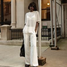 An image of @lefevrediary wearing a fine-knit top.