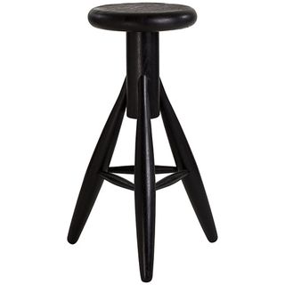 Black wooden three-legged bar stool