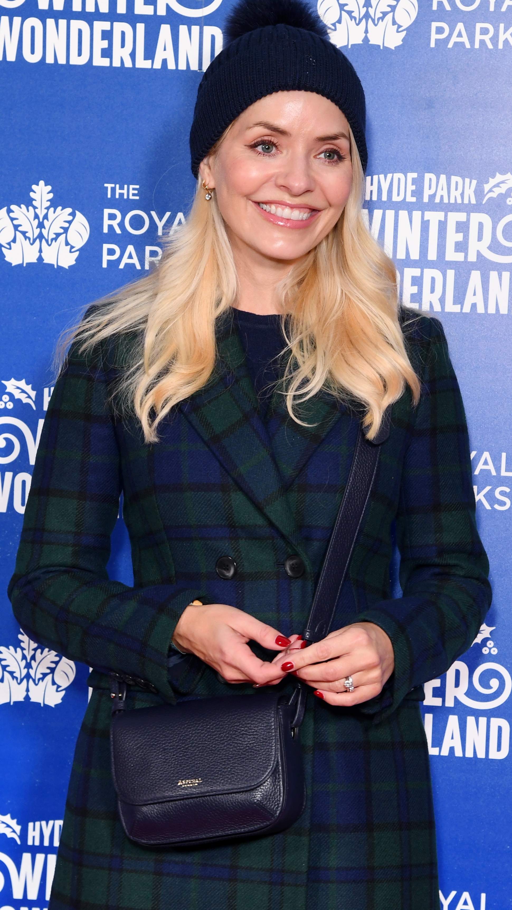 Holly Willoughby smiles for photos at the VIP preview event for Hyde Park Winter Wonderland at Hyde Park on November 13, 2025