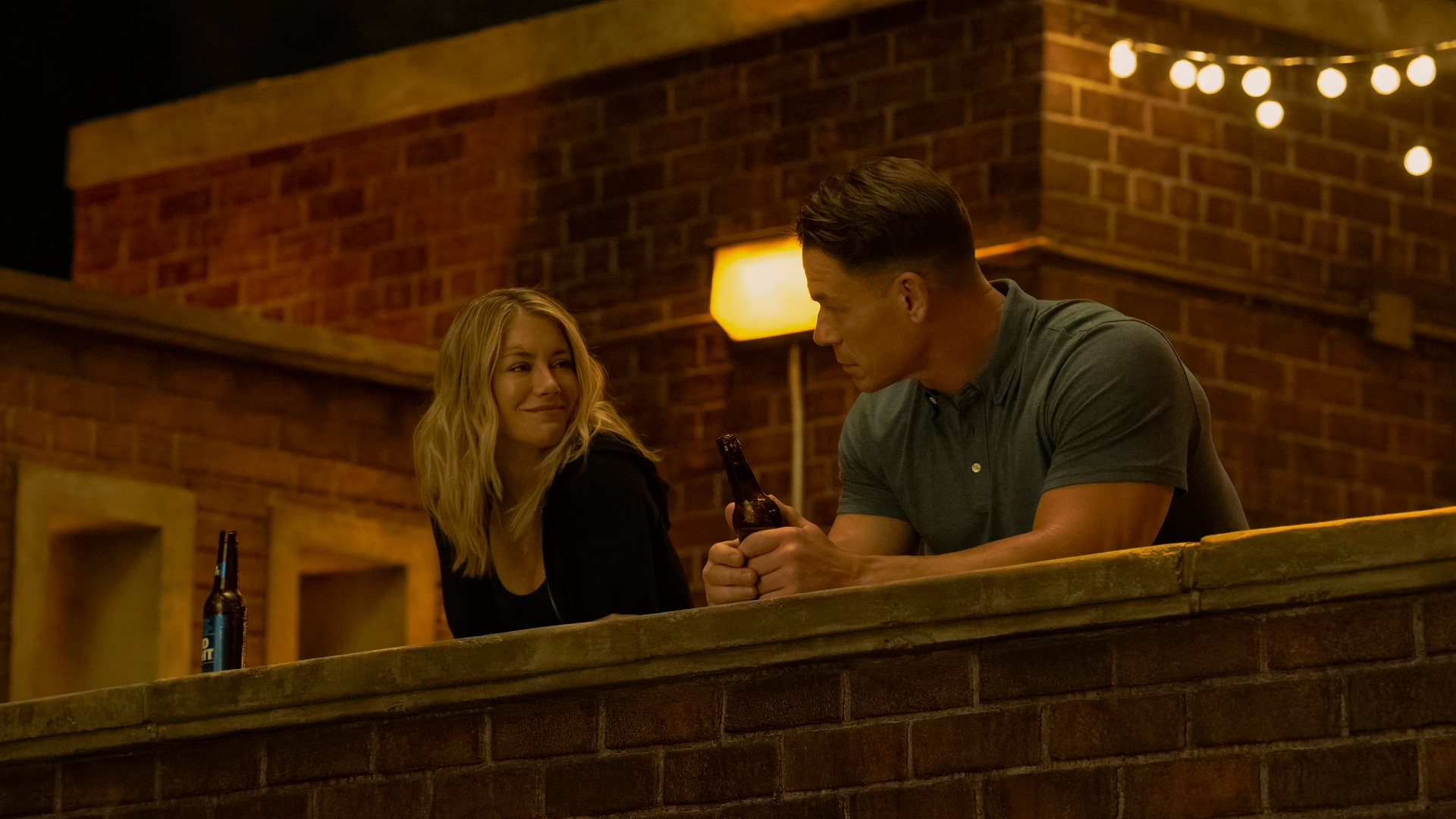 Jennifer Holland and John Cena in Peacemaker S2