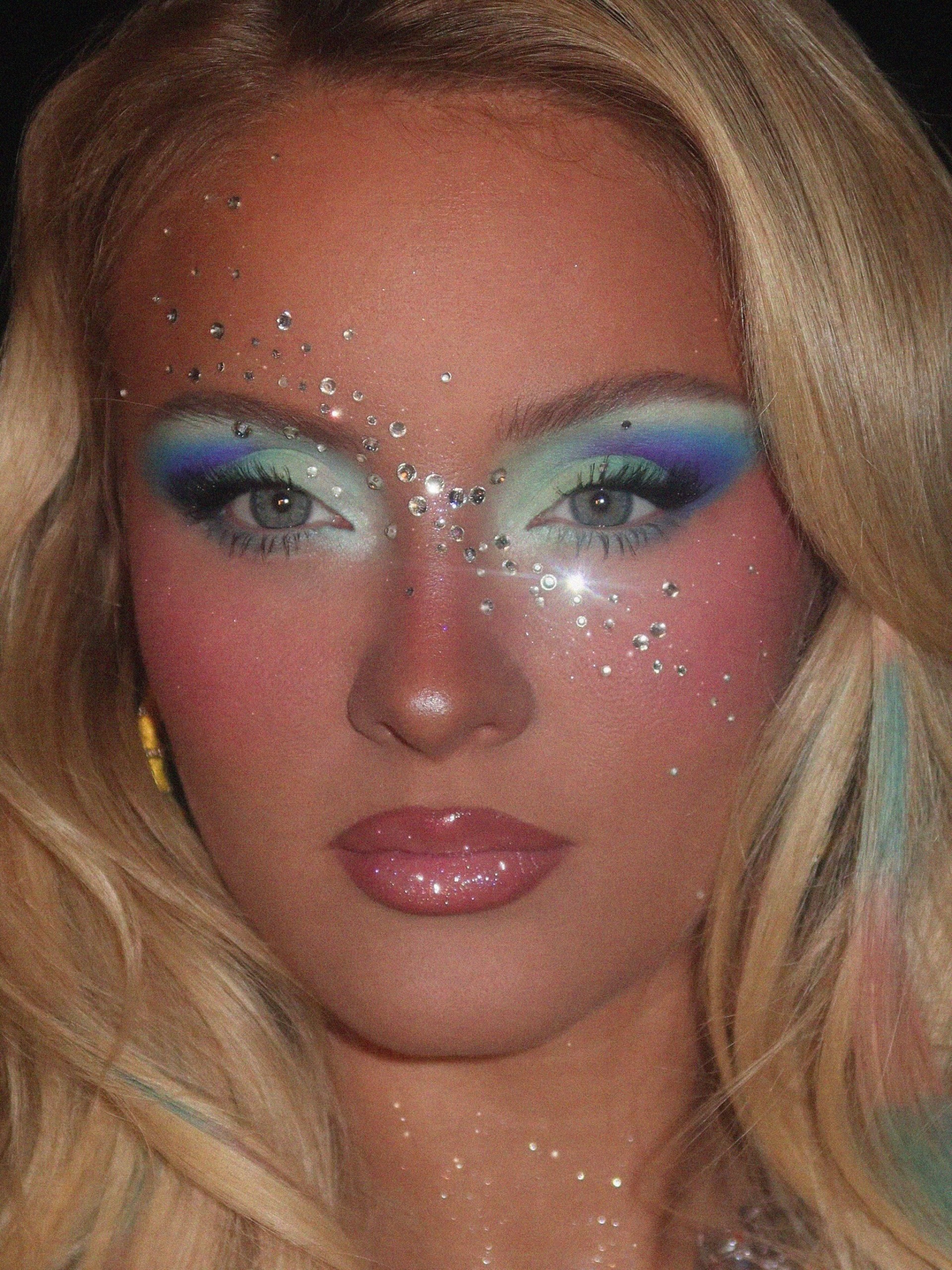 Zara Larsson's rhinestone makeup.