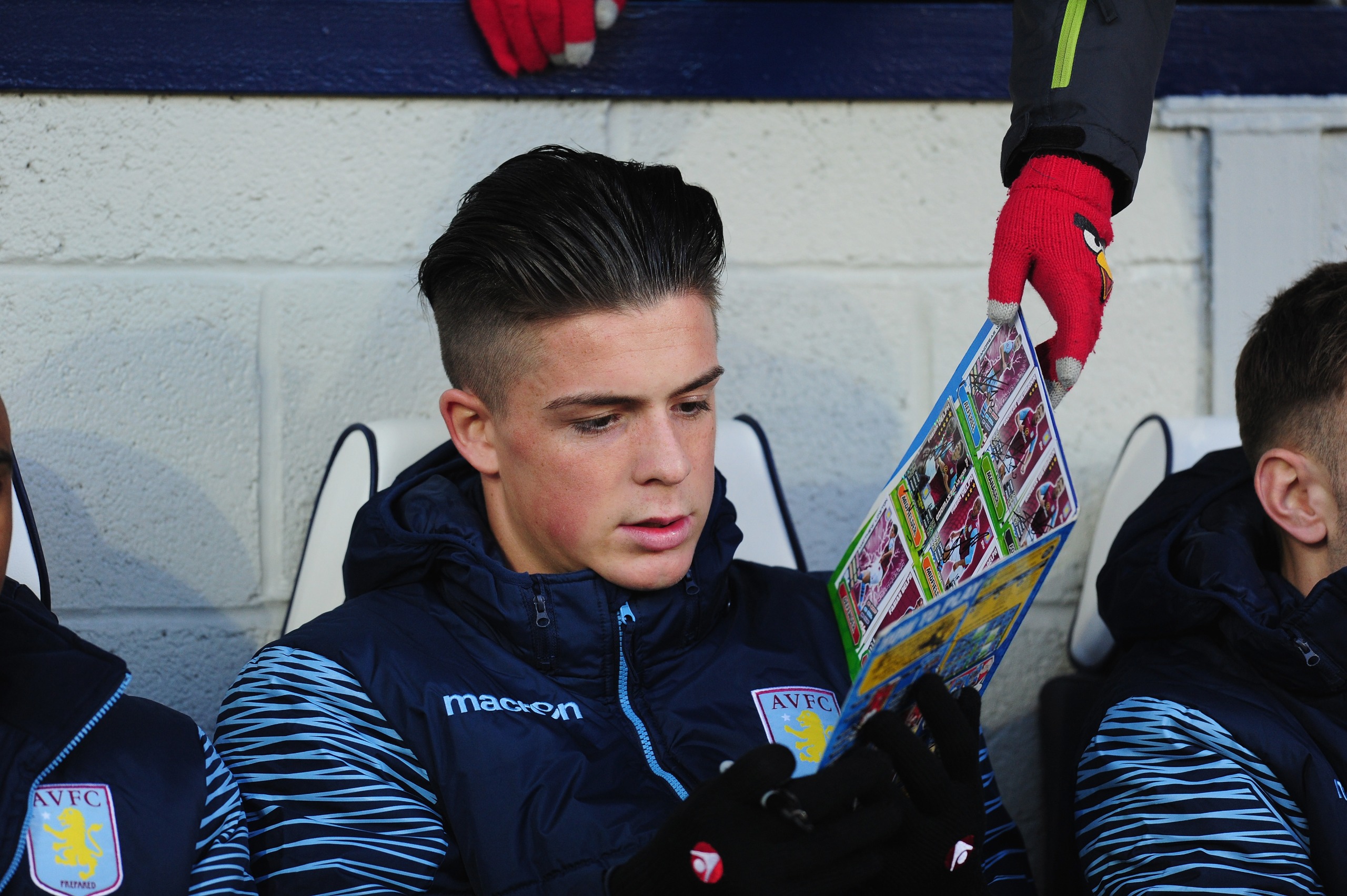 A young Jack Grealish signs a fan's Match Attax collection