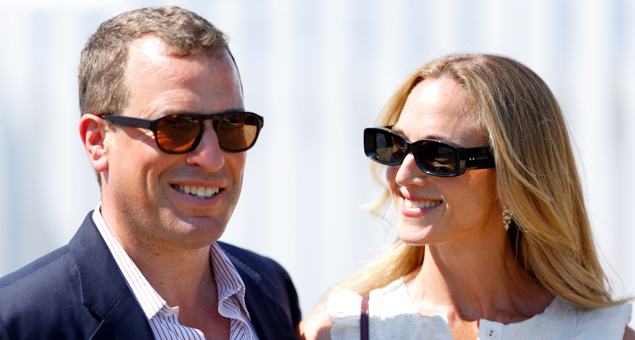 Peter Phillips and Harriet Sperling wearing sunglasses and smiling