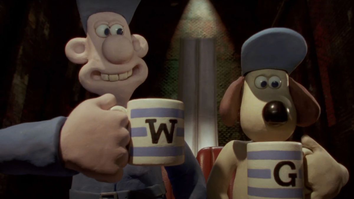 Wallace and Gromit holding mugs of tea in Wallace &amp; Gromit: The Curse of the Were-Rabbit.