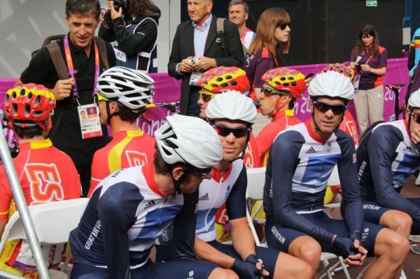 The Great Britain team wait to sign on