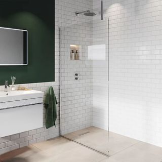 A wetroom screen in a light contemporary bathroom