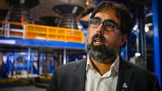 Amit Kshatriya, then NASA deputy associate administrator of the Moon to Mars Program, speaks to the press during an Artemis media event in the Vehicle Assembly Building at Kennedy Space Center in Florida, on Dec, 16, 2024. 