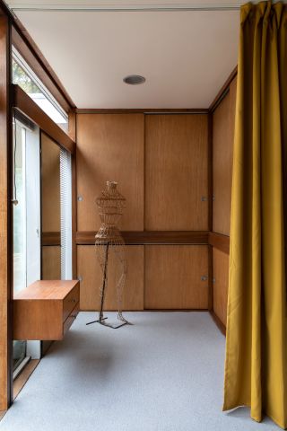 interior detail with wood panelling at restored Peter Womersley house in High Sunderland