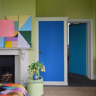 A colorful room painted with a Farrow & Ball color