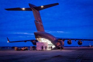 The Parker Solar Probe is loaded onto a C-17 cargo aircraft for shipment from Maryland to Florida in the early morning hours of April 3.