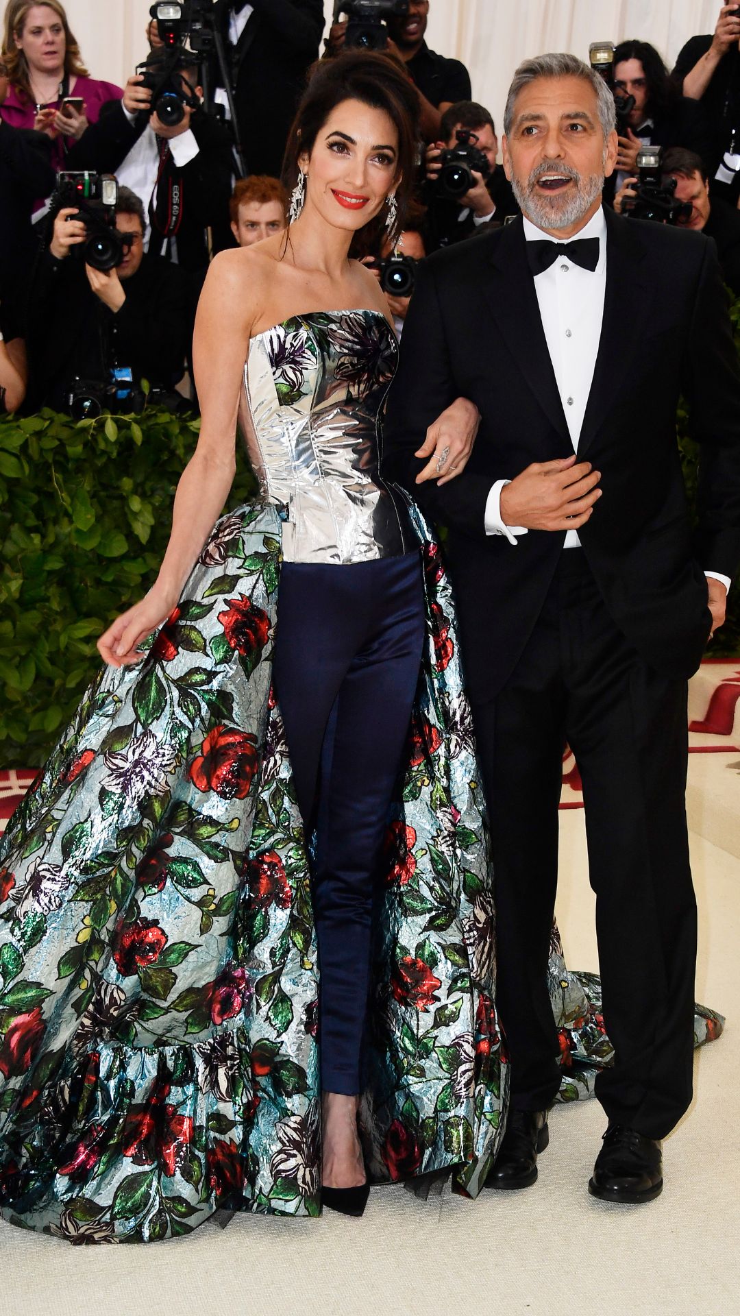 Met Gala co-host Amal Clooney and George Clooney attend the Heavenly Bodies: Fashion & The Catholic Imagination Costume Institute Gala at The Metropolitan Museum of Art on May 7, 2018 in New York City.
