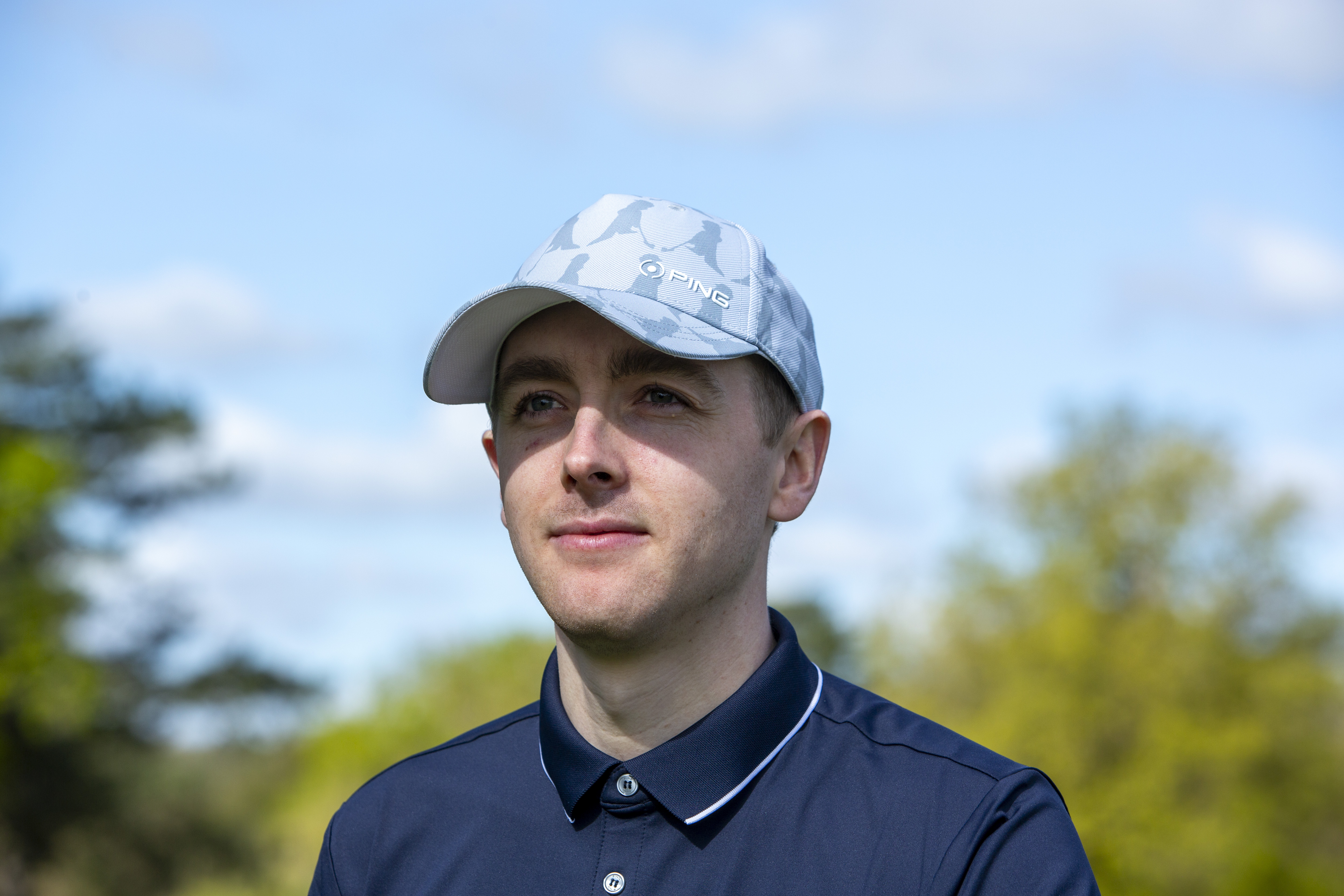 Jonny Leighfield in a blue Mr Ping II cap