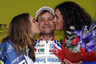 Michele Scarponi (Serramenti PVC Diquigiovanni-Androni Giocattoli) took the race lead with his stage win.