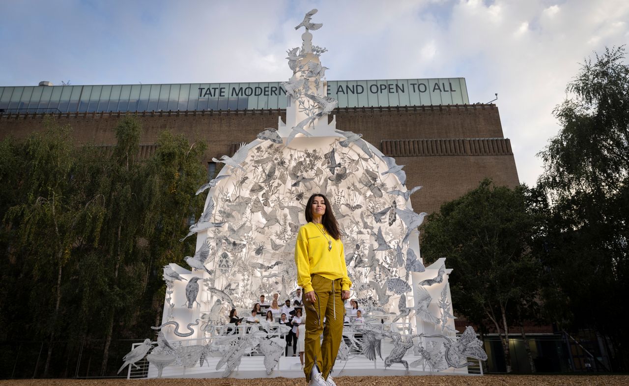 Es Devlin stands in front of Come Home Again, commissioned by Cartier and installed in front of Tate Modern.