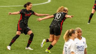 Portland Thorns celebrate LIndsey Horan's (10) goal during the NWSL Challenge Cup match between the OL Reign and the Portland Thorns on April 21, 2021, at Providence Park in Portland, Ore.