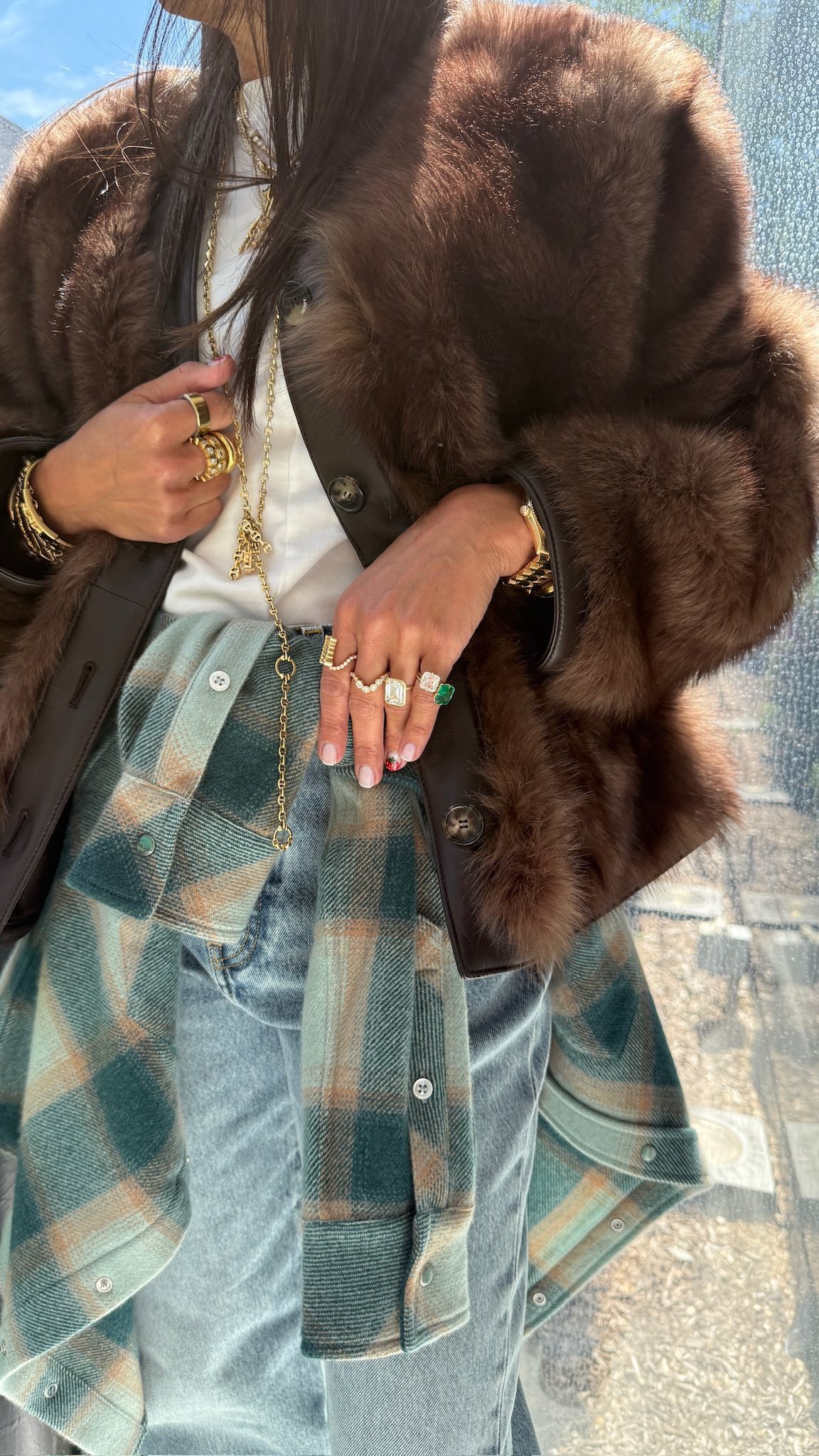 Marci Hirschleifer wearing a fall jacket and bag