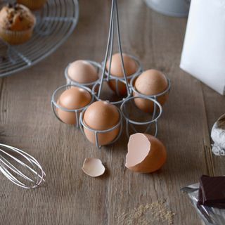 A tray with eggs for baking in the kitchen