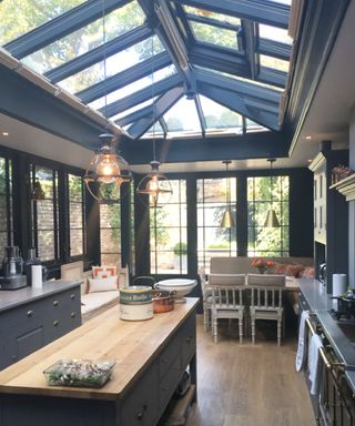 dark blue framed kitchen conservatory idea