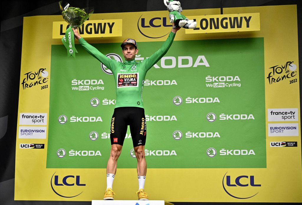 JumboVisma teams Belgian rider Wout Van Aert wearing the sprinters green jersey celebrates on the podium after the 6th stage of the 109th edition of the Tour de France cycling race 2199 km between Binche in Belgium and Longwy in northern France on July 7 2022 Photo by Marco BERTORELLO AFP Photo by MARCO BERTORELLOAFP via Getty Images