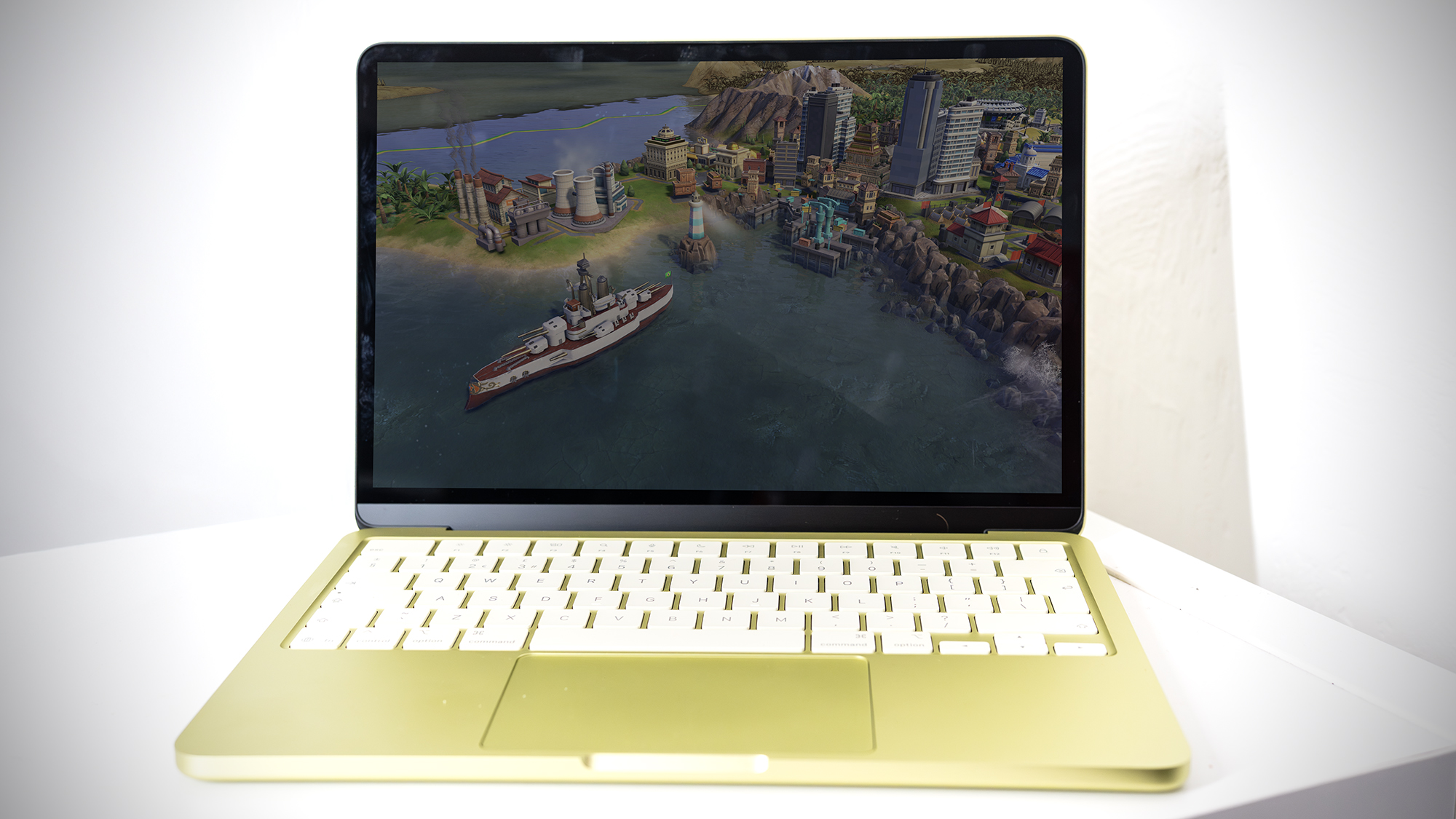 Apple MacBook Neo in Citrus colour.