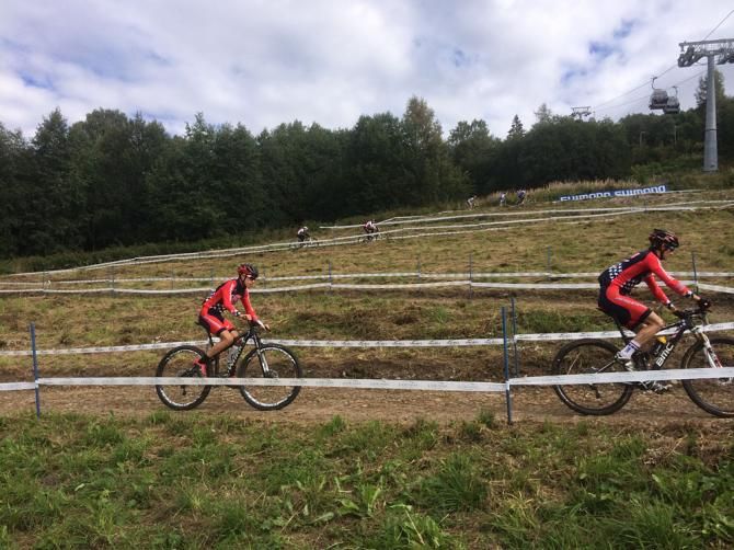 Stephen Ettinger leads another US rider on an open switchback climb