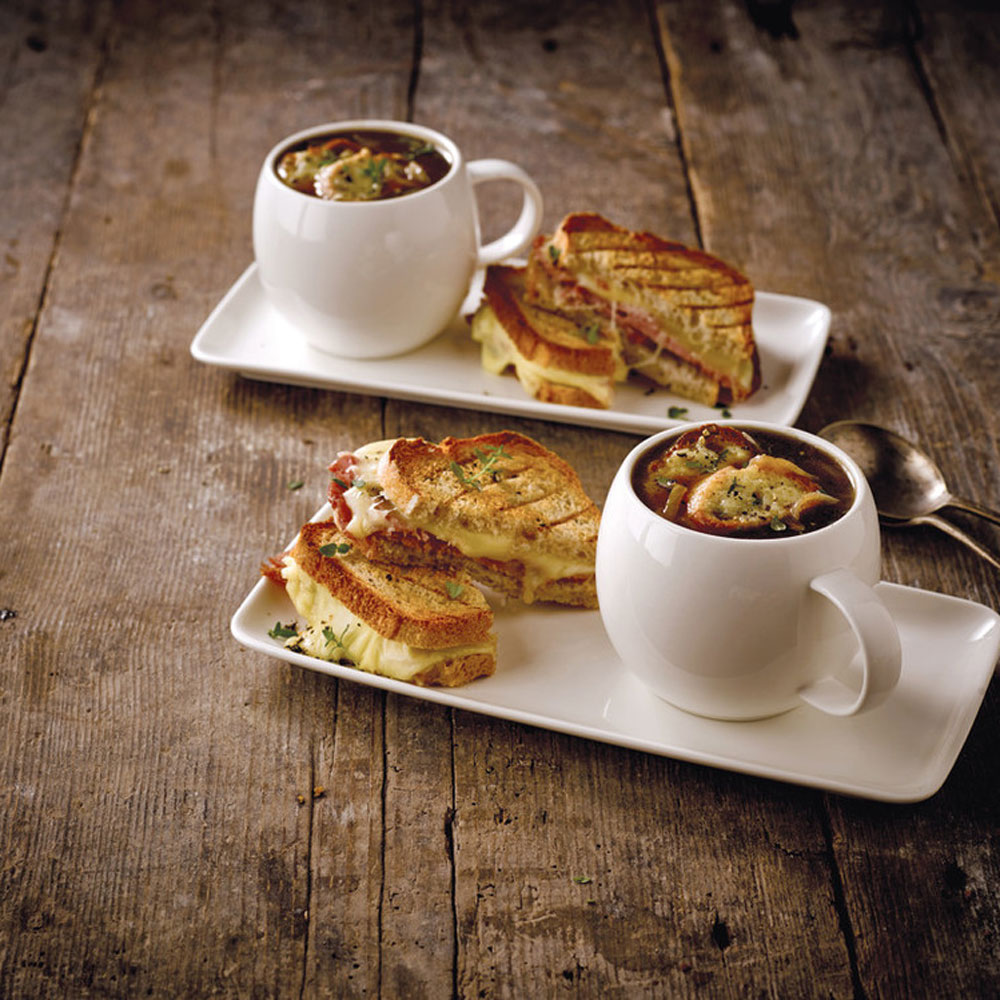 2 piece serving kit with soup sandwich and wooden table